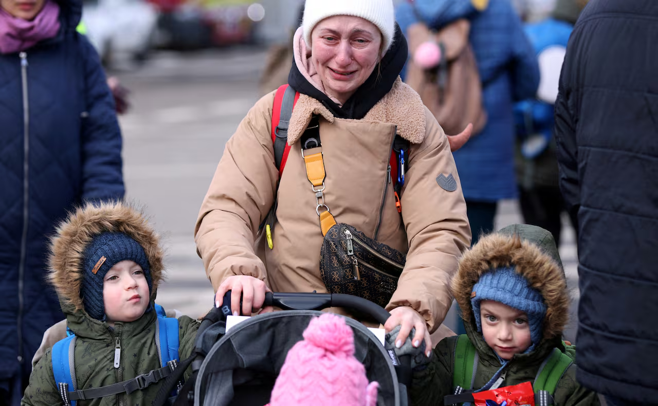 Ukrainian mother fleeing with children